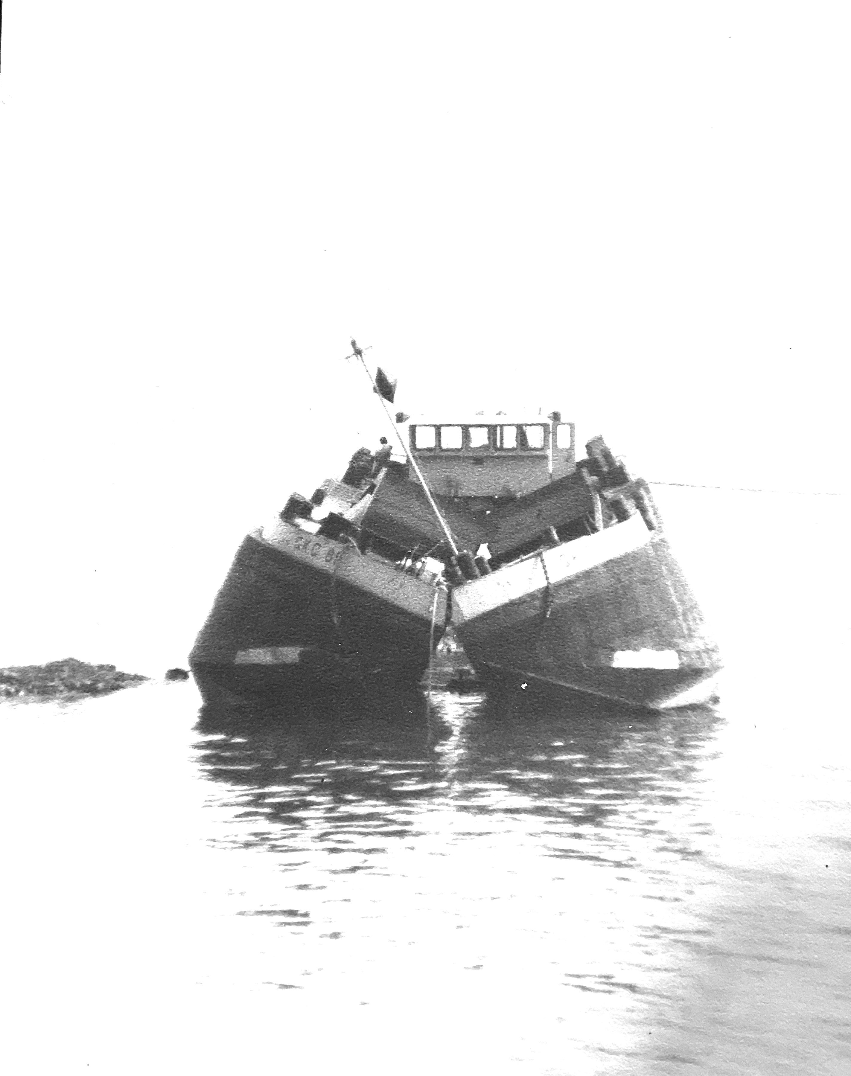 a barge split and stuck on its load